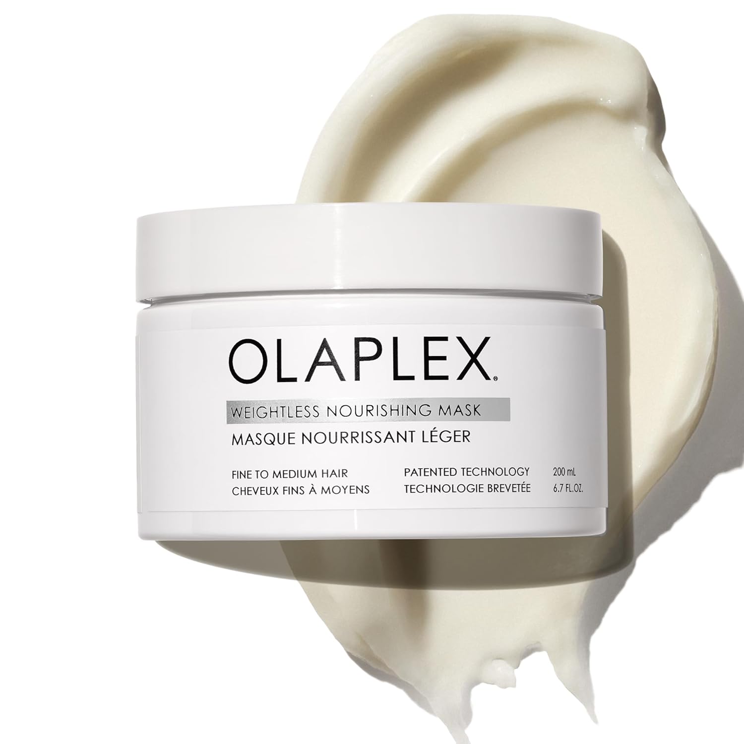 Olaplex Weightless Nourishing Mask jar with white lid and pale cream