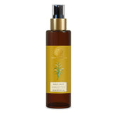 Forest Essentials body mist bottle with gold cap, amber glass and yellow label