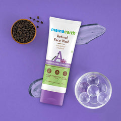Retinol face wash tube with purple cap; blue gel smear and small black berries.