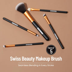 Five makeup brushes with golden handles and black shafts, soft bristles