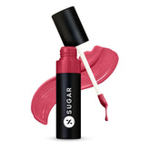 Glossy lipstick tube with strawberry pink-red smear and doe-foot applicator