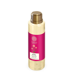 After bath oil bottle with gold pump cap, cream body, pink label