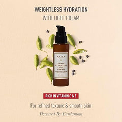 Kama Ayurveda Eladi light cream bottle with green leaves and dark seeds around it