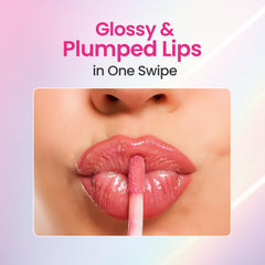 Plump-up wetgloss lip gloss on pink lips with applicator wand