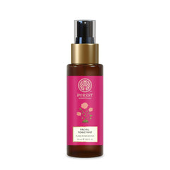 Facial tonic mist bottle with gold cap and pink Pure Rosewater label