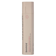 Davroe revitalizing conditioner bottle, beige plastic cylinder with red logo and side text