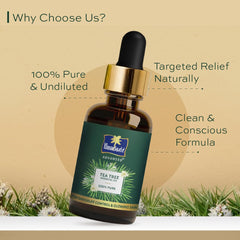 Tea tree essential oil bottle front view with label and icons on the side