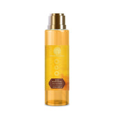 Body massage oil bottle with gold pump; amber liquid, 130 ml