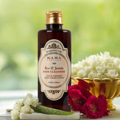 Hair cleanser bottle with Rose & Jasmine cream label, dark amber glass and gold cap.