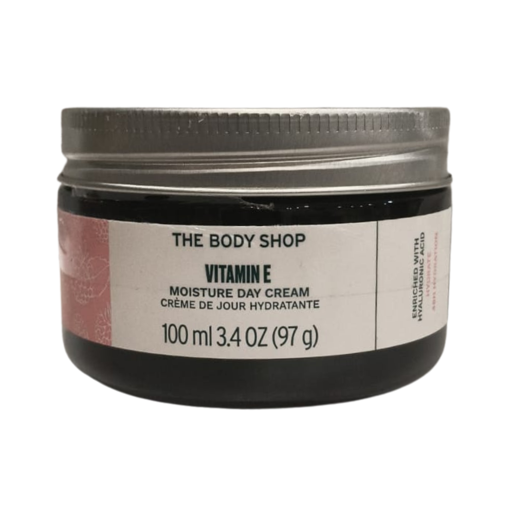 The Body Shop Vitamin E moisture day cream jar, black lid and label, 100 ml.