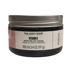 The Body Shop Vitamin E moisture day cream jar, black lid and label, 100 ml.