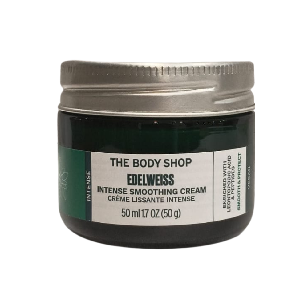 The Body Shop Edelweiss intense smoothing day cream jar, green glass with silver lid and white label