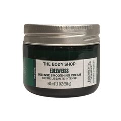 The Body Shop Edelweiss intense smoothing day cream jar, green glass with silver lid and white label