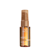 Wella Professionals Ultimate Smooth Miracle Oil serum bottle with pump