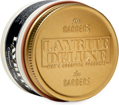 Layrite Cement Clay jar lid close-up, gold metal with Layrite Deluxe Barbers logo