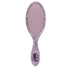 Purple hair detangling brush with dotted cushion pad, back view