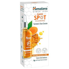 Dark spot clearing turmeric face serum box with amber bottle and dropper.