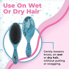 Oval hair detangling brush with blue textured handle, pin bristles on cushion pad