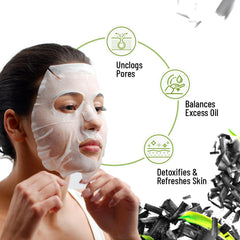 Woman wearing a sheet mask on her face with bamboo and charcoal graphics
