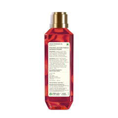 Amber-red head massage oil bottle with gold cap, rear label text, 200 ml