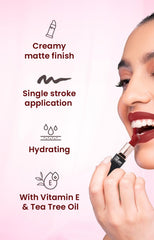 Swiss Beauty lipstick being applied to lips; creamy red-brown color