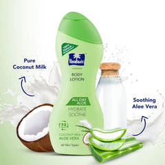 Parachute body lotion bottle with coconut milk and aloe pieces beside it