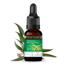 Eucalyptus essential oil bottle with black dropper and eucalyptus leaves.