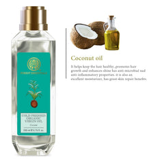 Coconut virgin oil bottle with gold cap, teal label and coconut oil graphic