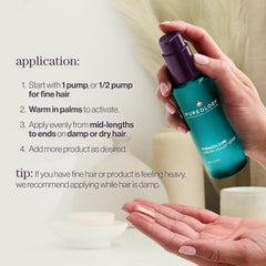 Hair serum bottle held in hand with purple pump top