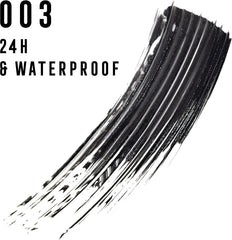 Waterproof mascara brush with thick black bristles coated in formula