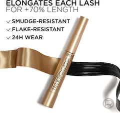 Gold mascara tube with brush applying dark lashes