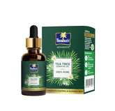 Tea tree essential oil bottle with dropper and green product box, 14 ml
