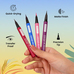 Hand holding sketch eyeliners with precision tips in pink, blue, and brown