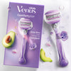 Women’s Venus Comfortglide razor with purple handle and triple blades