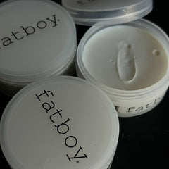 Fatboy Sea Salt Pomade jars with open lids, creamy white pomade inside