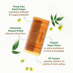 Small oil-treated neem wood comb with fine teeth, angled view