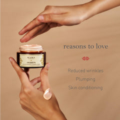 Amarrupa contour firming cream jar held in hands with a small amount of cream