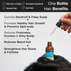 Tea tree essential oil bottle held by hand over hair-benefit graphic