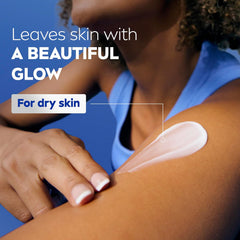 Body lotion applied to forearm with visible cream on skin