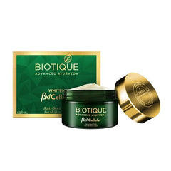 Biotique anti-spot pack set with dark green jar, gold lid, and green box