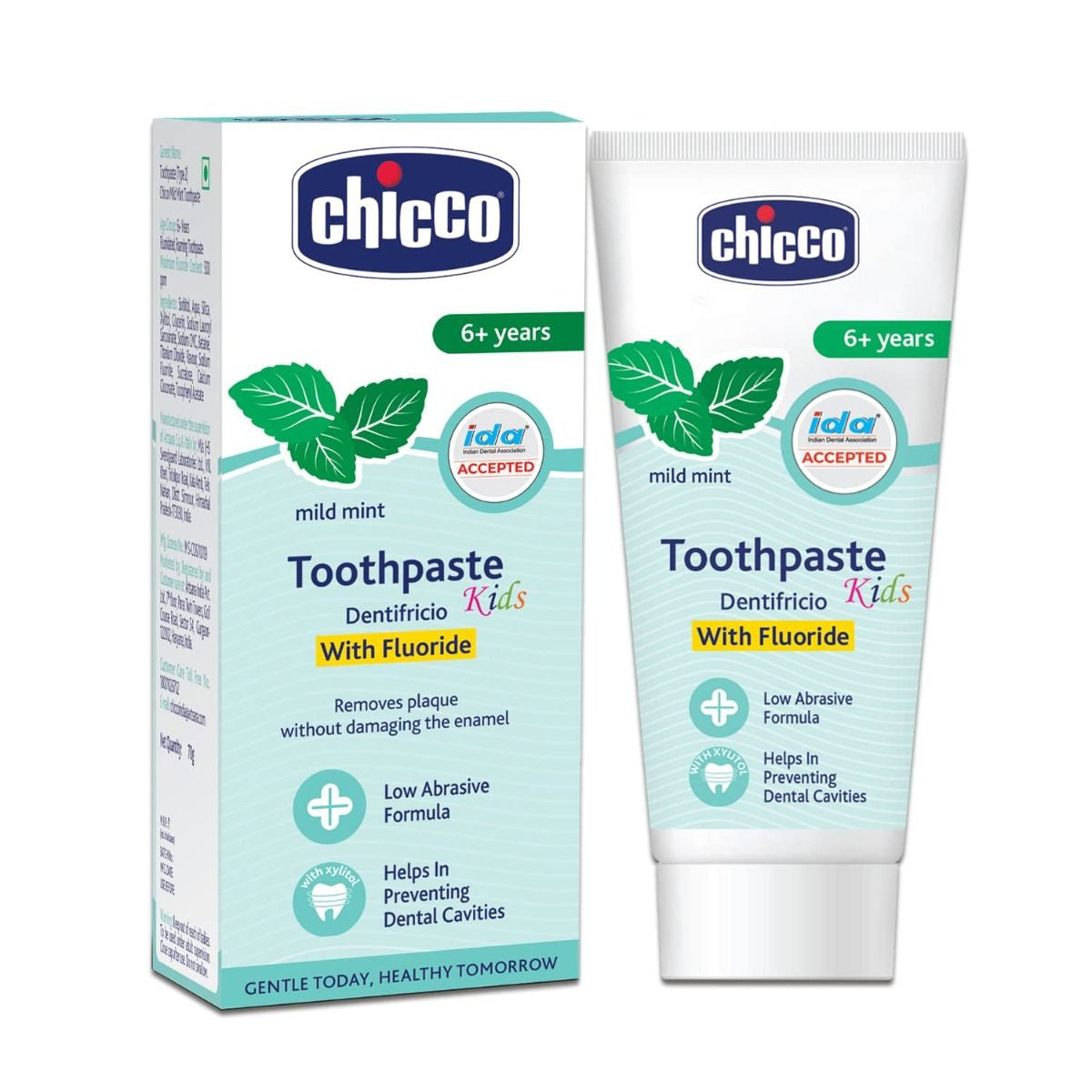Kids toothpaste tube, white with green mint accents and blue label, mild mint flavor.