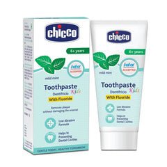 Kids toothpaste tube, white with green mint accents and blue label, mild mint flavor.