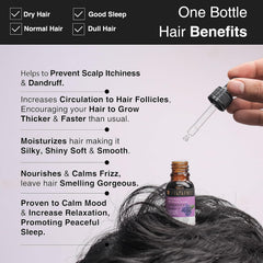Lavender essential oil hair benefits, dropper held above amber bottle