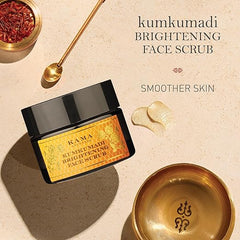 Face scrub jar with cream swirls, plus small gold bowl and spoon