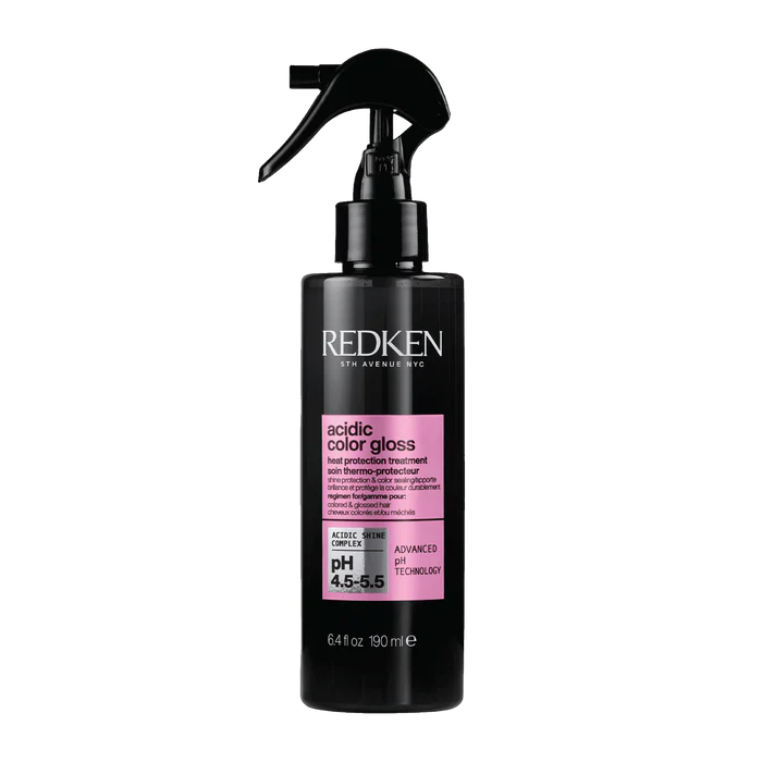 Redken acidic color gloss heat protection leave-in bottle with pink label and spray pump