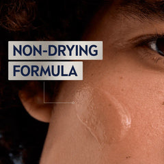 Men sensitive face wash non-drying formula text beside skin close-up with moisture sheen
