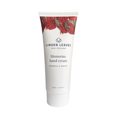 Linden Leaves Memories hand cream tube, white with red floral wrap, 100 ml.
