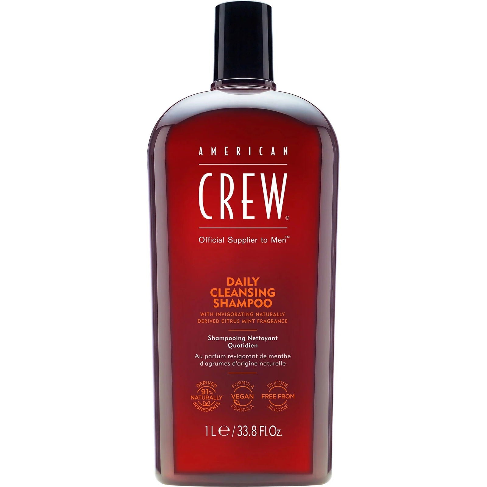 American Crew Daily Cleansing Shampoo bottle, 1 L, amber liquid with black cap
