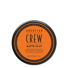 American Crew matte clay hair styling jar lid, orange label on black cap
