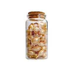 Angel hair vitamin leave-in capsule bottle with clear jar and golden capsules